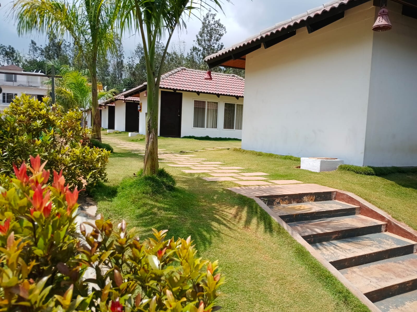 Private resort cottage with a wooden verandah